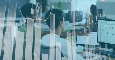 Team analyzing financial data with abstract overlays in modern office