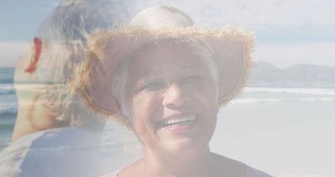Senior Woman Smiling on Beach with Double Exposure Effect