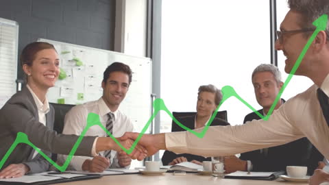 Business Professionals Handshake Success in Office with Graph Overlay