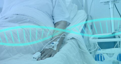 Patient Resting in Hospital Bed With IV and Recovery Devices