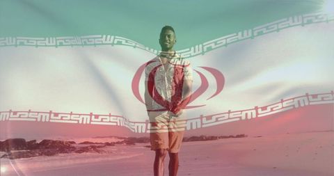 Standing man on beach with iranian flag overlay, coastal travel identity concept