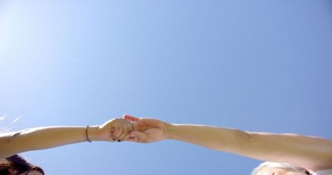 Hands Holding Honestly Posing Friendship Under Blue Sky