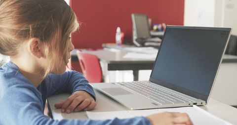 Student Engaging in Laptop-Assisted Learning at School Desk - Download Free Stock Images Pikwizard.com