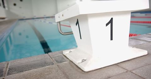 Starting Block at Swimming Pool Awaits Race