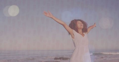 Woman Embracing Freedom by Serene Beach at Sunrise