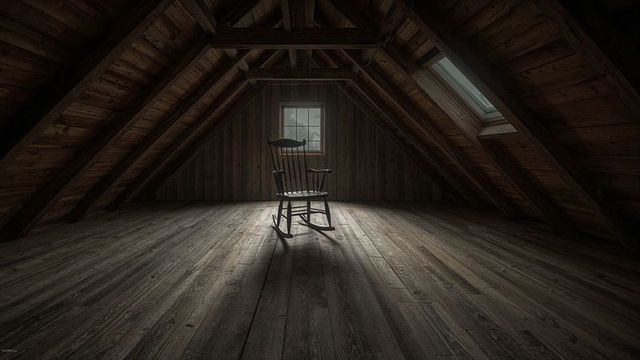 Solitary Wooden Rocking Chair in Rustic Attic Loft