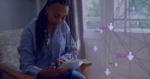 Confident Woman Engaging with Digital Tablet in Cozy Living Room