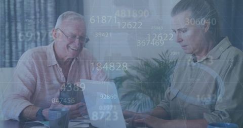 Senior Couple Engaging with Technology and Data