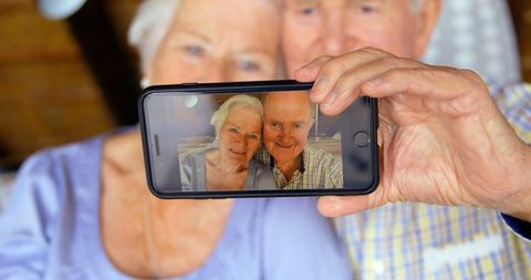 Senior Couple Taking a Joyful Selfie Together at Home - Download Free Stock Images Pikwizard.com