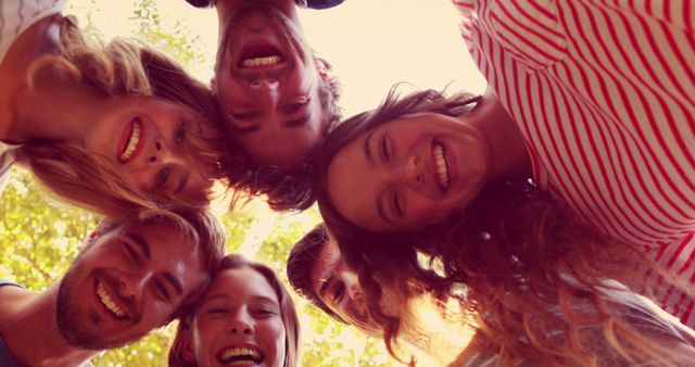 Joyful Group of Friends in Circle, Smiling and Having Fun Outdoors - Download Free Stock Images Pikwizard.com