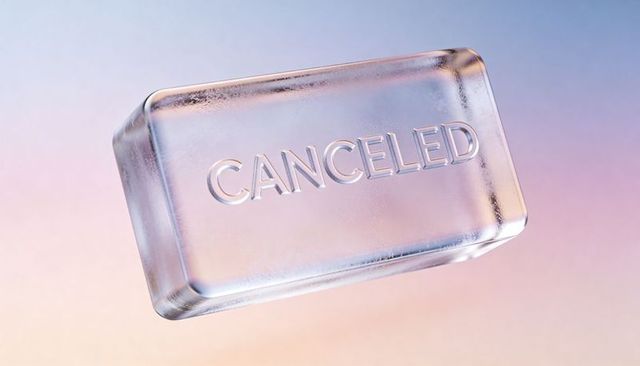 Translucent glass block embossed canceled text floating on pastel gradient