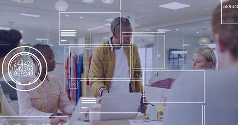 Creative team brainstorming in fashion design studio