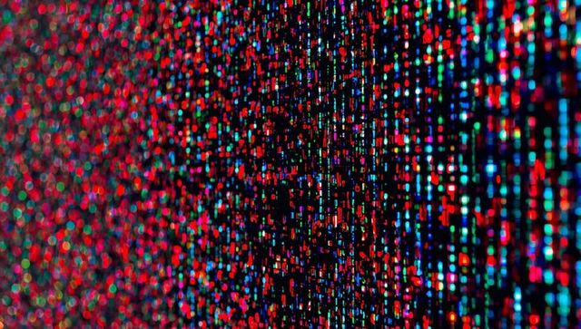 Abstract rgb led pixel matrix close-up with vertical columns and colorful bokeh lights