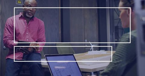 Architectural Planning and Discussion in Modern Office with Copy Space