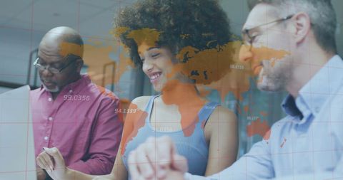 Diverse Team Analyzing Financial Data with World Map Overlay