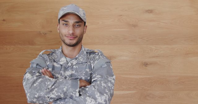 Confident Young Soldier Wearing Camouflage Uniform - Download Free Stock Images Pikwizard.com