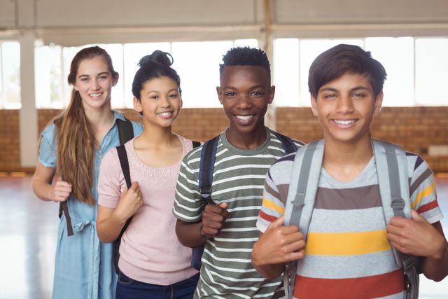 Diverse Group of Happy Students with Backpacks in School Campus - Download Free Stock Photos Pikwizard.com