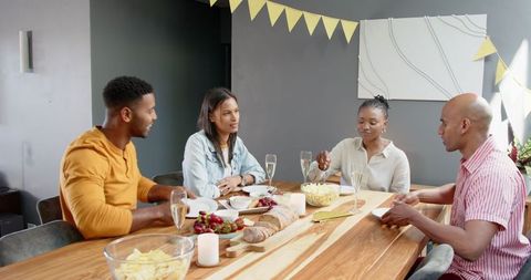 Multiracial Friends Celebrating Birthday at Elegant Home Gathering