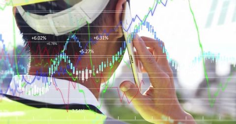 Construction Worker Analyzing Financial Data on Phone