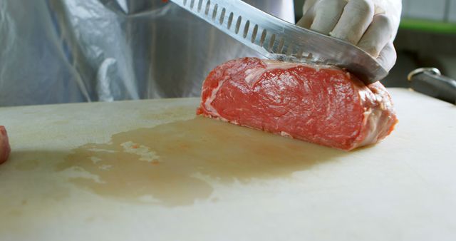 Butcher Slicing Fresh Beef - Download Free Stock Images Pikwizard.com