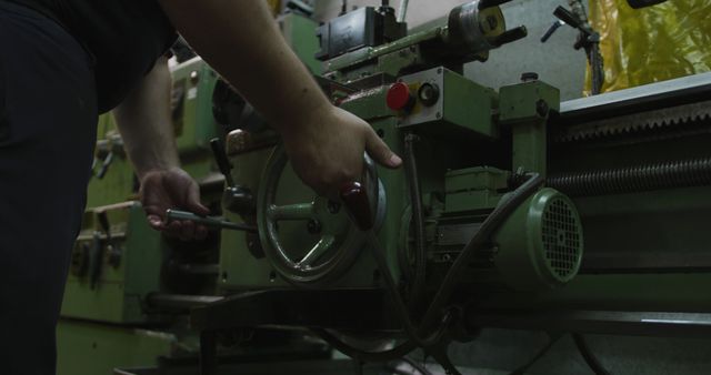 Worker Operating Industrial Lathe Machine in Metal Workshop - Download Free Stock Images Pikwizard.com