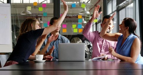 Team Celebrating Success with High Fives - Download Free Stock Images Pikwizard.com
