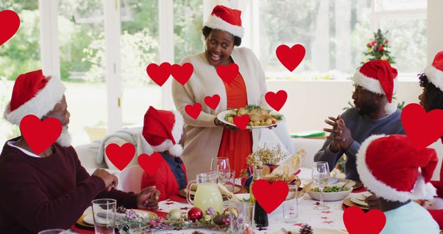 Family Celebrating Christmas Dinner with Santa Hats - Download Free Stock Images Pikwizard.com