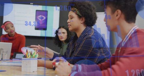 Diverse Team Analyzing Data in Modern Conference Room Environment