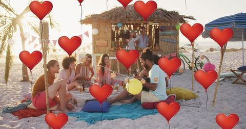 Friends Gather for Beach Party With Digital Heart Icons
