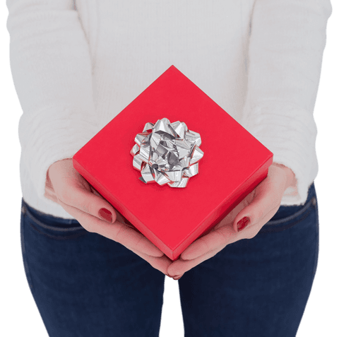 Woman holding red gift box with silver bow transparent background
