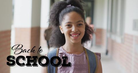 Happy Biracial Schoolgirl Ready for Back to School - Download Free Stock Images Pikwizard.com