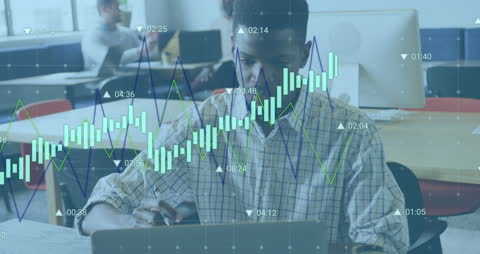 Business Analyst Reviewing Data Visualizations with Integrated Technology