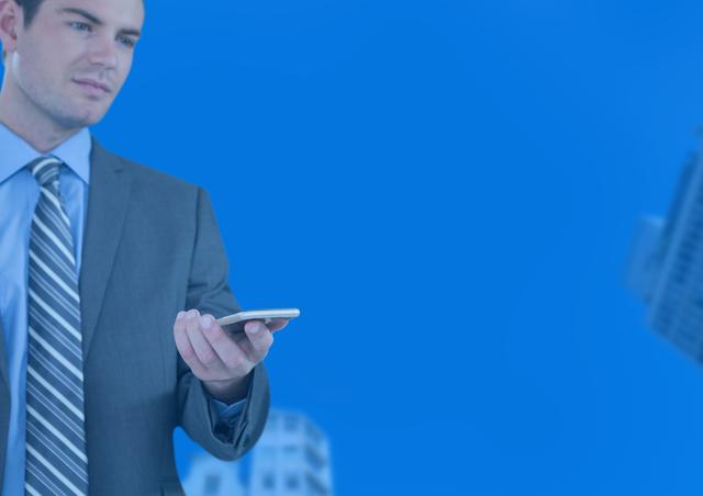 Digital composite of Businessman with phone and blue background