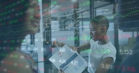 Diverse Professionals Analyzing Financial Data Projections