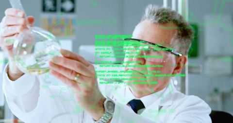 Scientist Analyzing Chemical Solution with Digital Interface - Download Free Stock Images Pikwizard.com
