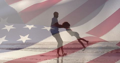 Father and Daughter Play on Beach with U.S. Flag Overlay