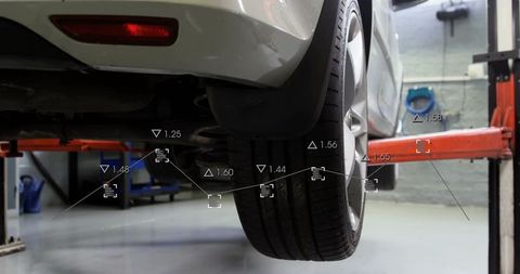 Rear-Right Car Wheel and Suspension on Lift with Augmented Reality Diagnostic Overlay