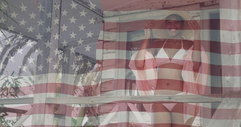 Patriotic Summer Vibes: Woman in Bikini with American Flag