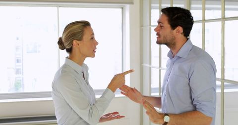 Young Professionals Arguing in Modern Office - Download Free Stock Images Pikwizard.com