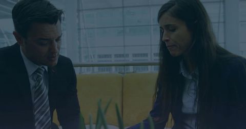 Corporate Business Discussion in Office Lounge with Professionals