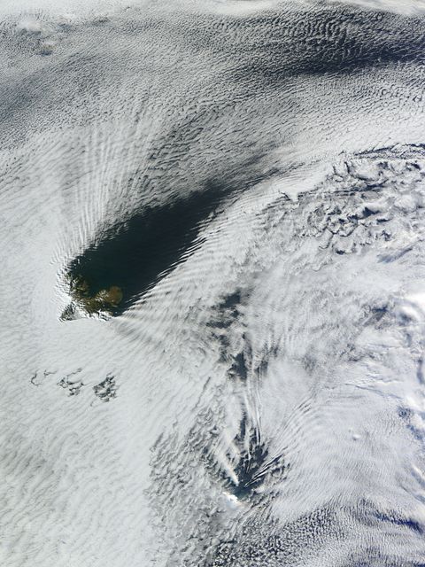 Ship-wave-shaped wave clouds induced by Kerguelen and Heard Islands, South Indian Ocean.  Terra/MODIS 2013/190 07/09/2013 05:00 UTC  Credit: NASA/GSFC/Jeff Schmaltz/MODIS Land Rapid Response Team  <b><a href="http://www.nasa.gov/audience/formedia/features/MP_Photo_Guidelines.html" rel="nofollow">NASA image use policy.</a></b>  <b><a href="http://www.nasa.gov/centers/goddard/home/index.html" rel="nofollow">NASA Goddard Space Flight Center</a></b> enables NASA’s mission through four scientific endeavors: Earth Science, Heliophysics, Solar System Exploration, and Astrophysics. Goddard plays a leading role in NASA’s accomplishments by contributing compelling scientific knowledge to advance the Agency’s mission.  <b>Follow us on <a href="http://twitter.com/NASA_GoddardPix" rel="nofollow">Twitter</a></b>  <b>Like us on <a href="http://www.facebook.com/pages/Greenbelt-MD/NASA-Goddard/395013845897?ref=tsd" rel="nofollow">Facebook</a></b>  <b>Find us on <a href="http://instagram.com/nasagoddard?vm=grid" rel="nofollow">Instagram</a></b>