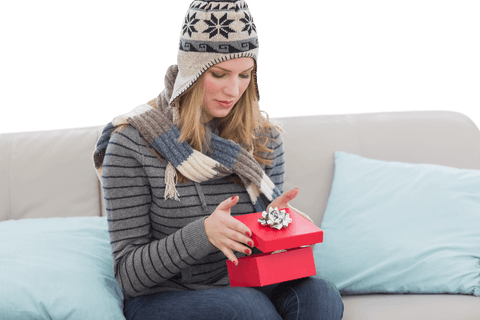 Happy Woman Opening Gift Box with Joyful Anticipation