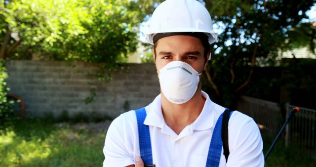 Construction Worker Standing Firmly in Safety Gear at Construction Site - Download Free Stock Images Pikwizard.com