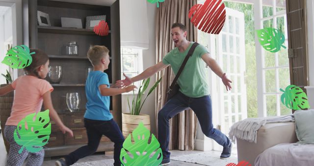 Father joyfully reuniting with children amid leaf decorations at home - Download Free Stock Images Pikwizard.com