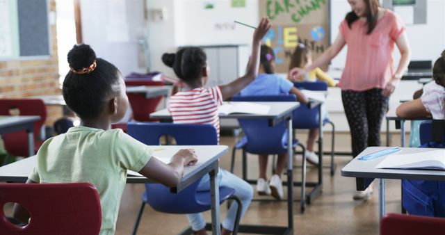 Students Engaging in Classroom Activity with Teacher Leading - Download Free Stock Images Pikwizard.com