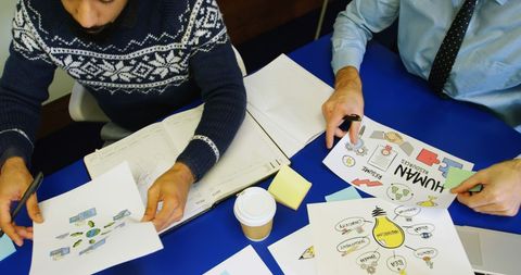 Creative Teamwork Brainstorm Session Over Marketing Concepts