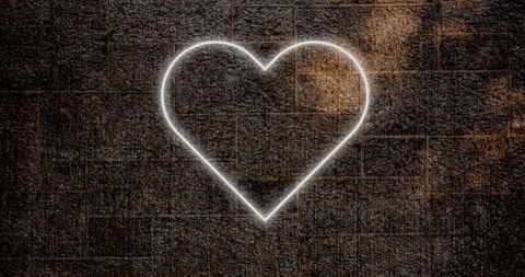 Neon Heart Sign Glowing on Brick Wall in Urban Environment - Download Free Stock Images Pikwizard.com