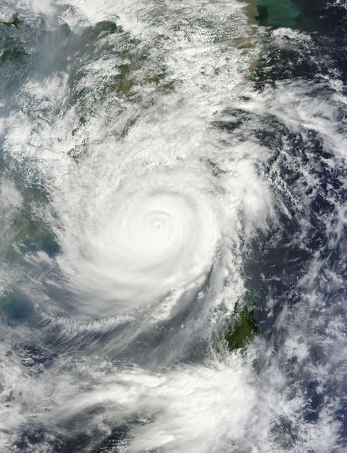 This image captured by the MODIS instrument aboard NASA's Terra satellite displays Typhoon Usagi on September 22, 2013 moments before making landfall in China. This particular time-lapse data allows meteorologists, climate scientists, and educators to analyze and study storm development patterns. This image can be used in meteorological research, educational articles on typhoons, and climate change documentation.