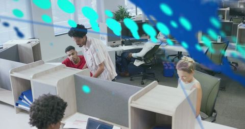 Diverse coworkers collaborating amidst digital data projections