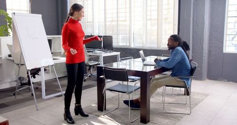 Team Meeting and Collaboration in Modern Office Environment